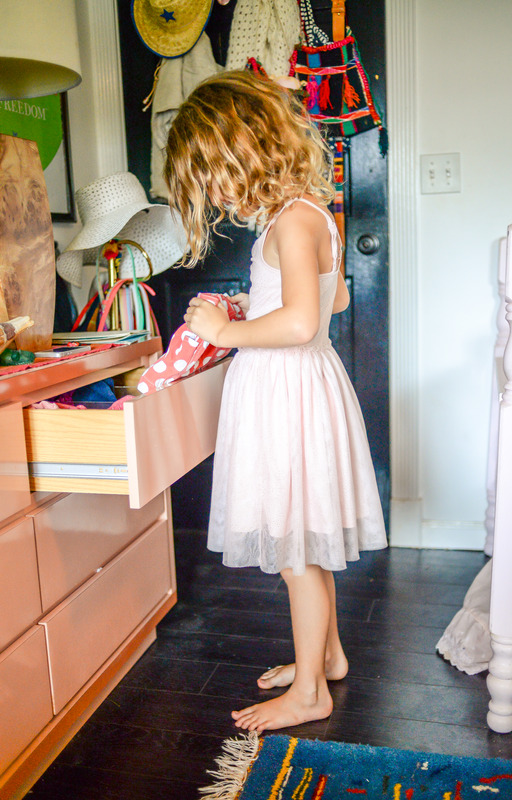 child picking out their clothes