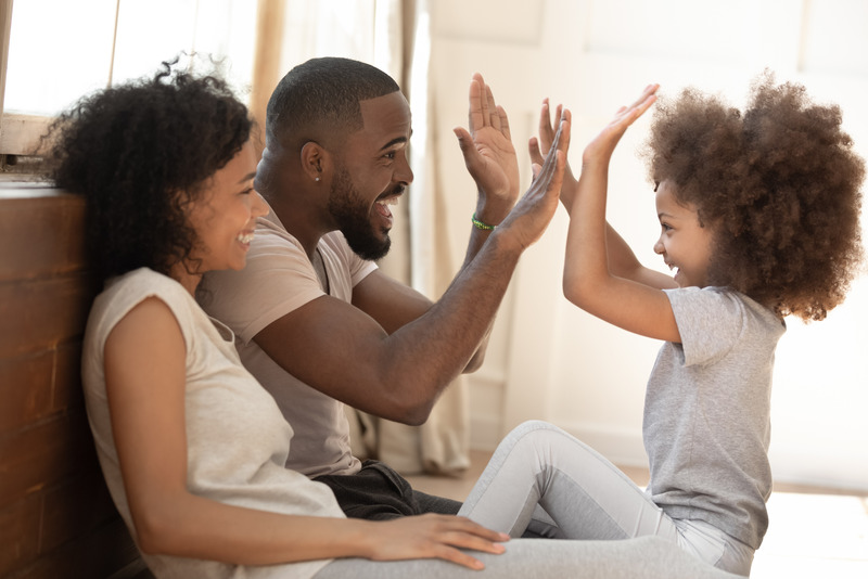 Parents celebrating with child