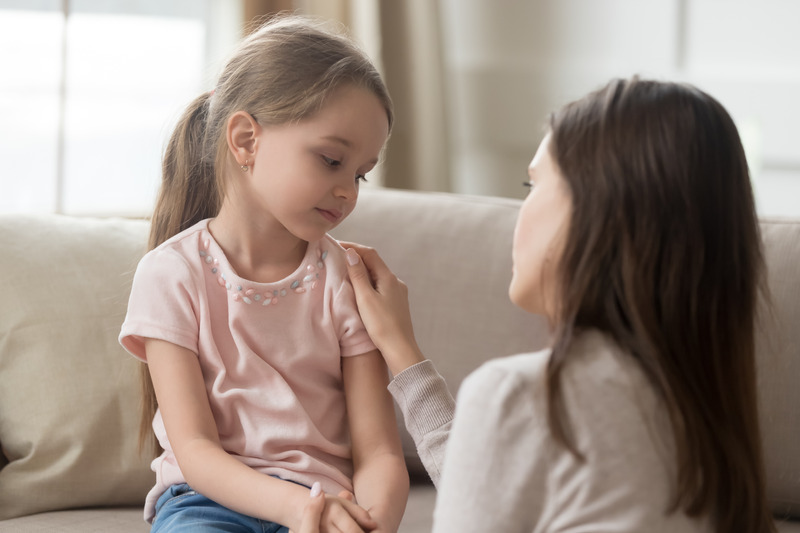 Mother talking to child